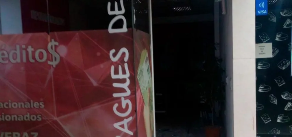 Dos detenidos tras robar una notebook, un aire acondicionado y un celular de un comercio