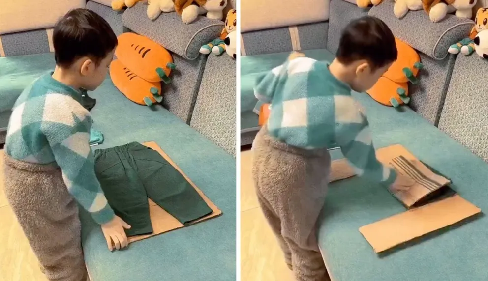 China: un nene muestra el truco viral para doblar la ropa